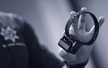gps.jpg Officer holding a monitoring device