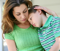 mother-comforting-child-200X172.png A mother comforting her young child.