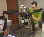 A researcher installs the Snoopy A-Series 60 LIDAR module on a small unmanned aircraft system. A researcher installs the Snoopy A-Series 60 LIDAR module on a small unmanned aircraft system.