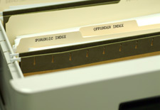 principles_of_dna_09_-_codis_indexes.jpeg Photo of file folder with two folders in it