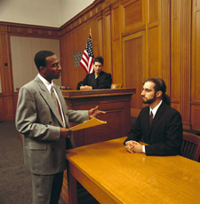 principles_of_dna_11_-_expert_testimony.jpeg Photo inside of a courtroom where an expert is being interviewed