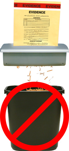 principles_of_dna_11_-_shredding_evidence.jpeg Photo of evidence folder being put into a paper shredder with a red circle with a diagonal cross through it over top
