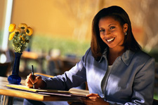 Written Communications Photo of female writing