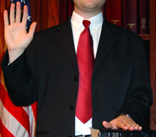 Courtroom Testimony Photo of individual getting sworn in to testify