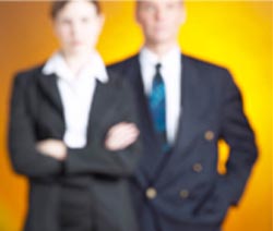 Appearance Photo of man and woman in professional business attire
