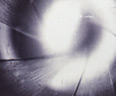 firearms_examiner_02_-_land_and_groove.jpg Photo of land and grooves on a bullet