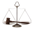 firearms_examiner_02_-_scales.jpg Photo of a set of scales with a judge's gavel