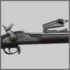 firearms_examiner_03_-_1865_springfield_allin_conversion.jpg Blurry closeup of a rifle