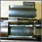 firearms_examiner_03_-_enfield_snider_conversion.jpg Blurry closeup photo of a firearm