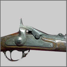 firearms_examiner_03_-_falling_block_action.jpg Close up photo of an old rifle