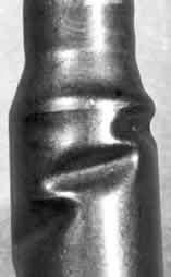 firearms_examiner_05_-_crimping_3.jpg Collapsed Case