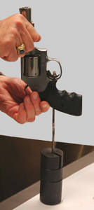 firearms_examiner_08_-_trigger_weights.jpg Revolver in position on trigger weights