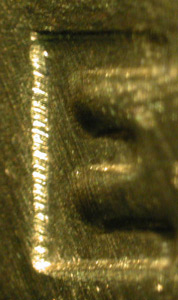 firearms_examiner_09_-_cartridge_cases_2.jpg Bunter Marks on two Remington brand 12-gauge shotshells