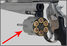 firearms_examiner_09_-_firearms.jpg Revolver cylinder, loaded with cartridges