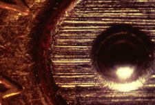 firearms_examiner_09_-_fired_case_examination.jpg Side by side comparison of breechface marks