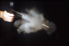 firearms_examiner_12_-_powders_and_residues.jpg Firearm discharging