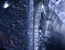 firearms_examiner_13_-_pattern_identification.jpg Microscopic comparison of evidence slice marks in bullet and known marks