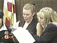 principles_of_dna_14_-_victim_considerations.jpeg Photo of a victim crying while reading a statement in court