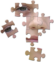principles_of_dna_15_-_puzzle_face.jpeg Photo of a puzzle with a face on it