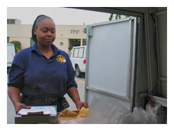 Laboratory Time and Resources - sorting woman sorting evidence in the back of a truck