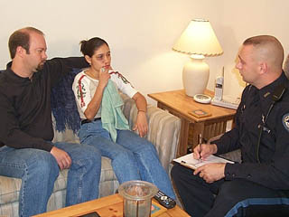 Interviews Photo of law enforcement officer conducting an interview
