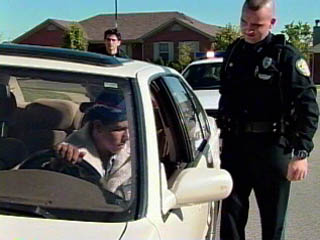 Motor Vehicles Scenario 2 Photo of Officer Murphy initiating a traffic stop after observing a car swerving.