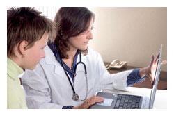bph_handling.jpeg A doctor and child looking at a computer screen