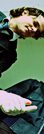 familial_searching_-_examples.jpeg investigator with bloody glove on