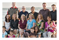 familial_searching_-_overview.jpeg Family posing for a photo together