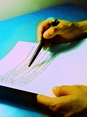 going_over_checklist.jpeg Photo of hands going over a checklist on paper