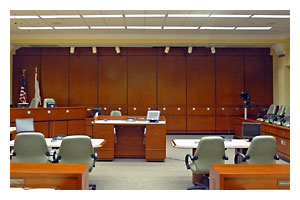 investigation_through_arrest_phases.jpeg Photo of an empty courtroom