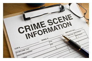 prioritizing_evidence_at_the_scene.jpeg clipboard with paper that says crime scene information