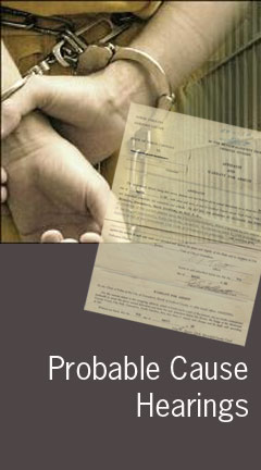 probable_cause_hearings.jpg Photo of a man's hands in cuffs. Caption says 'Probably Cause Hearings'