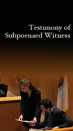 testingsubpoenaed.jpg  Photo of a female lawyer discussing the testimony of a Subpoenaed Witness