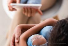 Young person talking to a mentor Young person talking to a mentor